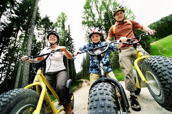 Roller - Vater mit Kids